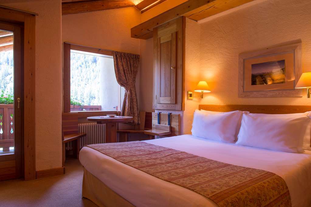 Eco Wellness Hotel Notre Maison Cogne Room photo