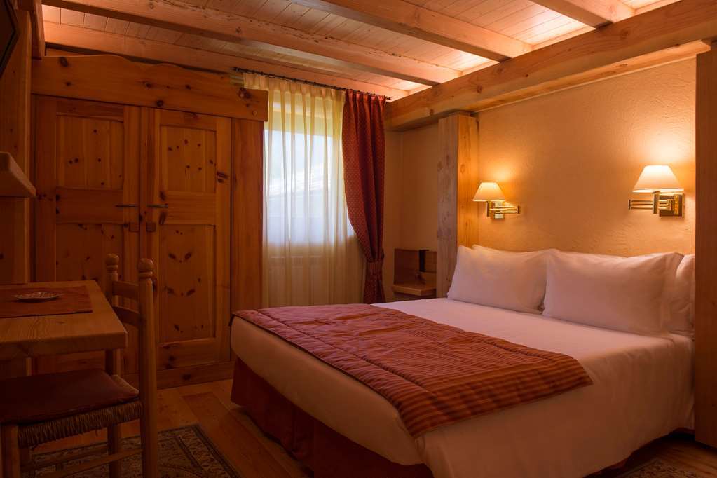 Eco Wellness Hotel Notre Maison Cogne Room photo