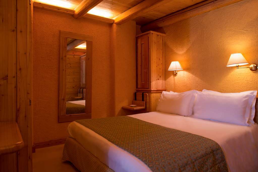 Eco Wellness Hotel Notre Maison Cogne Room photo